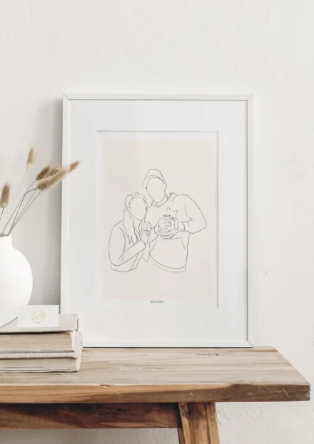 Cadre personnalisé couple et animaux d'un dessin minimaliste en noir et blanc d'une femme, un homme et un chat. Création de Denadda illustrée à partir d'une photo pour une décoration de salon.