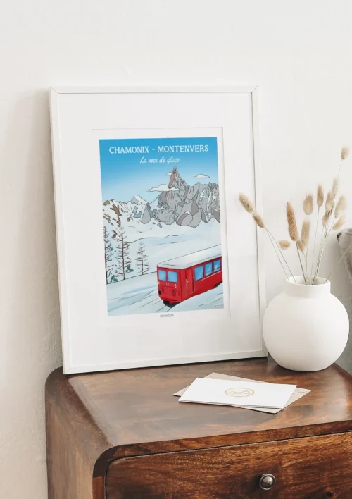 Cadre Chamonix Montenvers - Mer de Glace "Le train rouge" Cadre Chamonix Montenvers, illustration du petit train rouge face aux montagnes et à la Mer de Glace, création Denadda pour une décoration chalet à la montagne.